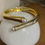 Thumbnail: Hinged bangle with pearl.Available in silver and gold plated.