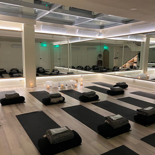 A calming candlelit Yin class focused on holding postures for extended periods using props to deeply target connective tissues, helping to release the body, quiet the mind, and improve flexibility, with optional sound healing elements.
