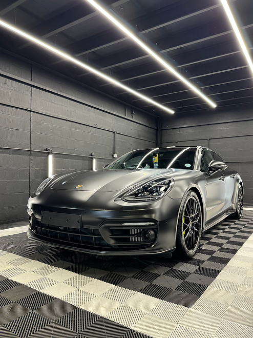 Silver car in a garage