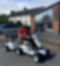 Mossy, the mascot for Mobility One Stop Shop, dressed as a Queen's Guard