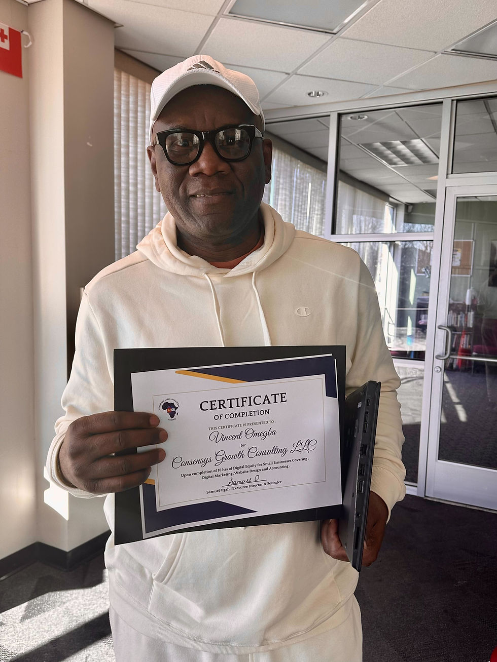 Mr. Vincent Omegba, CEO of Consensys Growth Consulting LLC, proudly receives his graduation certificate and laptop during his graduation from the Digital Equity Mini Grant program.