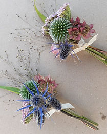 two echinops buttonholes.jpg