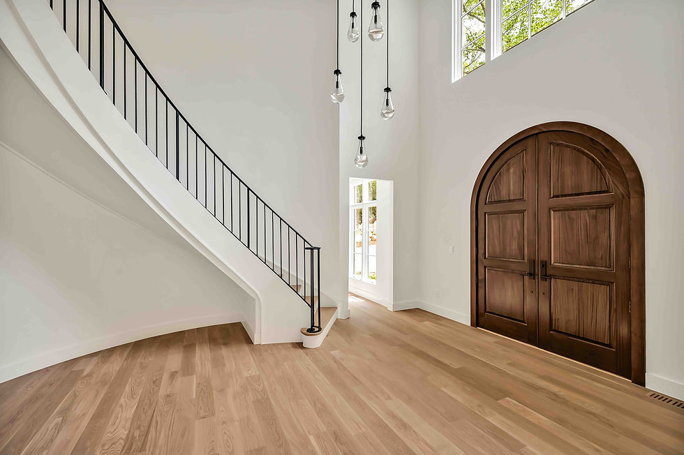 staircase, lighting fixture and arched doorway in chapel hill