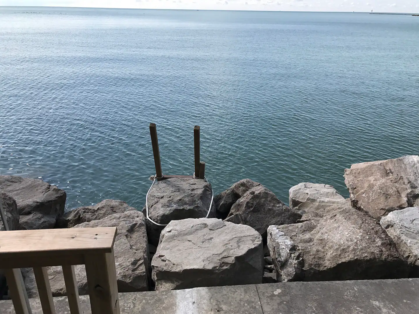 steps to the lake from private pation