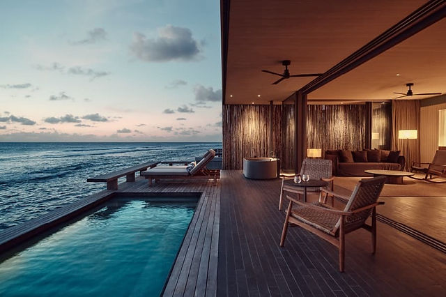 Water villa night view at Patina Maldives