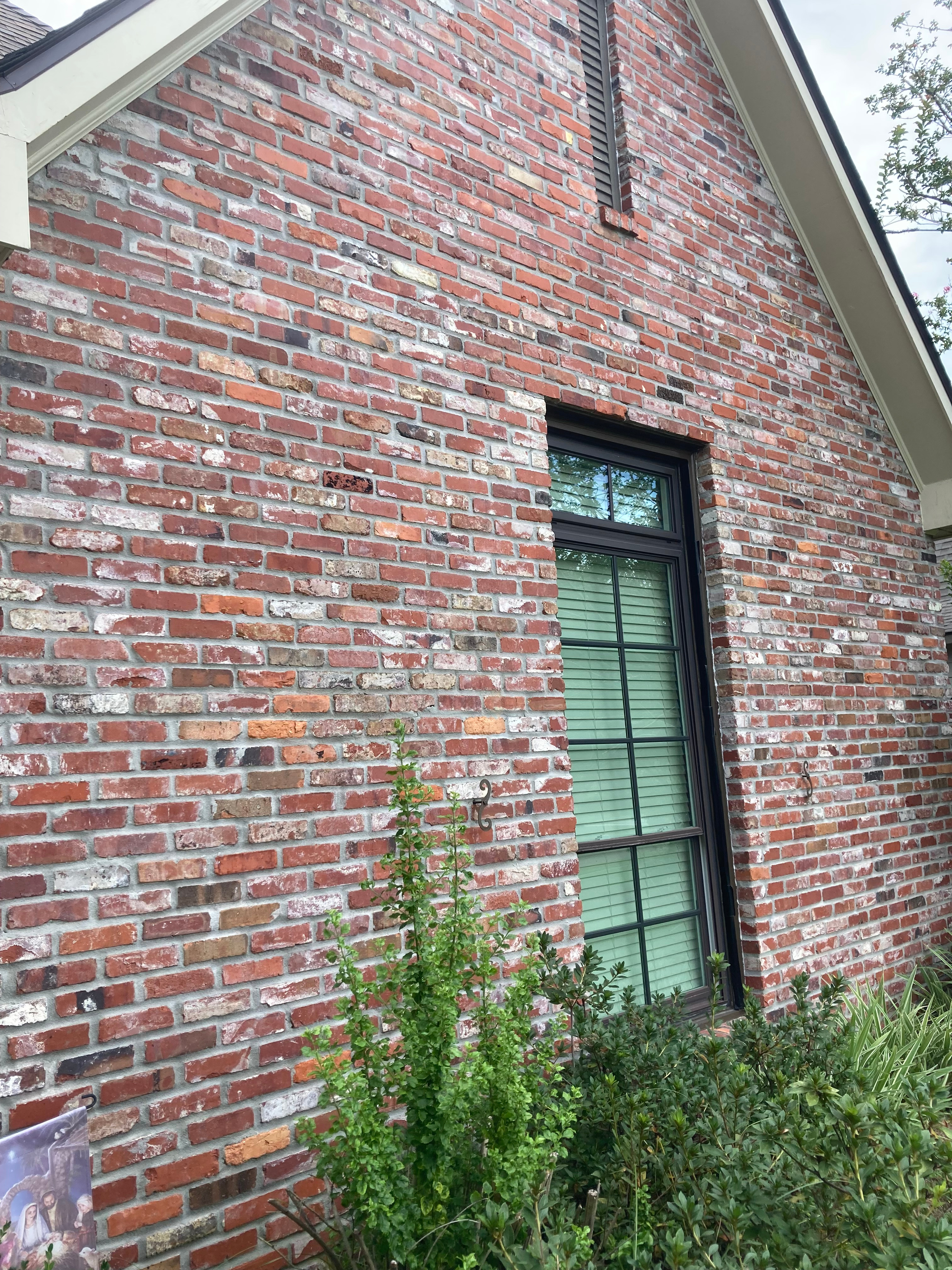 Side of house made up of antique St. Louis Reds