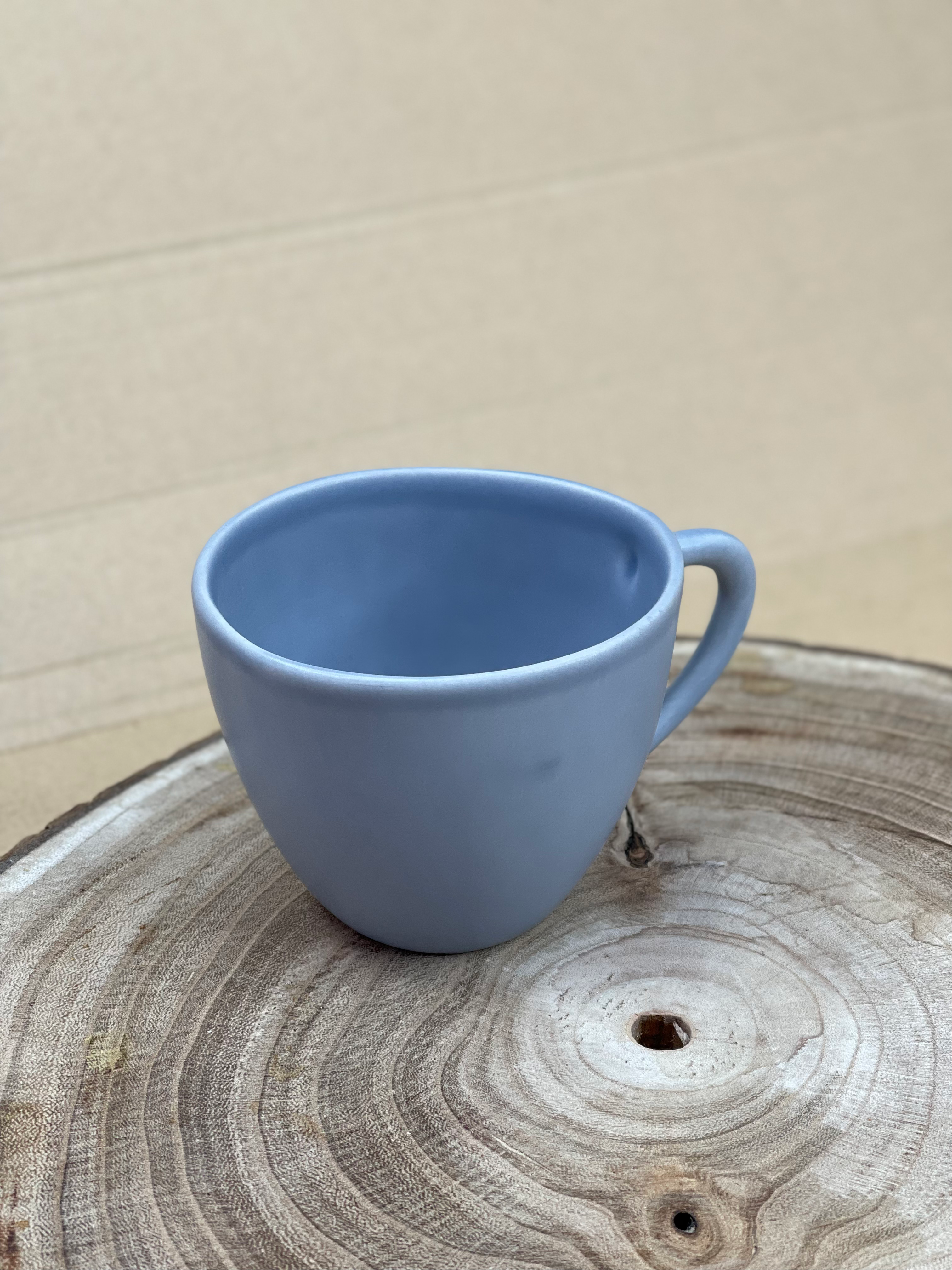 Caneca de leite baixa.