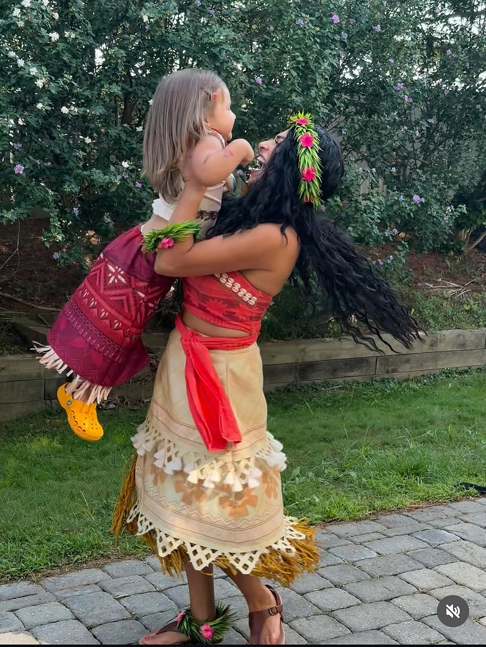 Moana the wayfinder spinning and twirling a little birthday girl in her moana outfit
