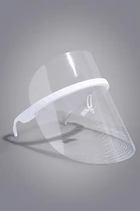 Thumbnail: Illumi USB LED light therapy mask for face mask angled view for glowing skin treatment