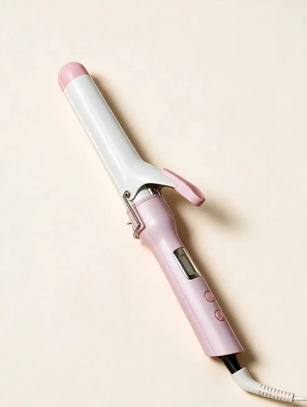 Bouncy Babe 1.25 inch curling iron in pink and white with digital display and clamp