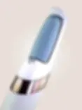Electric callus remover with precision roller for gentle removal of rough, dry skin.
