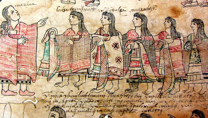 Textile practices have for a long time been considered a relic of women’s past and of their confinement inside domestic spaces, where needlework was mostly a hobby or a source of revenue and self-sustainment. Encouraged by the feminist movement’s advocacy for the recognition of women’s art, the artistic value of techniques like knitting, crocheting, and embroidery is finally being recognized. Textile arts have also been a way to reconnect with women of the past, to understand and empathize with them. In her article Weaving the Fabric of Our Lives , feminist historian and thealogian Carol Christ (1997) writes that “like every woman on the planet, I am descended from women who created things of use and beauty with their hands” (p.135) and reveals that learning about textiles has made her feel closer to her female relatives and to women in general. Unfortunately, such interest in women’s textile production has started only recently and since then, feminist scholars have stressed the importance of analyzing women’s textile art as an important and influential cultural phenomenon, and not just a utilitarian product dictated by material necessity. The conceptual divide between fine arts and women’s “arts and crafts” has also been questioned, bringing to light the cultural and artistic value that female textile creations have had in the past, and how they have evolved to become subversive tools for feminist artists and movements. Throughout Western history, women have hardly ever been recognized as artistic agents or subjects, although they were often the objects of art, and in her essay Why Have There Been No Great Women Artists?  feminist art historian Linda Nochlin (2018) observed that many women have been excluded from recognized art because of the western European concept of the Great Artist, who “is conceived as one who has ‘Genius’; Genius, in turn, is thought of as an atemporal and mysterious power somehow embedded in the person of the Great Artist” (p.153). Associated with the Genius were ideals of creativity, individuality and independent thinking, qualities that were exclusively identified as masculine. Decorative arts like knitting or embroidery were regarded as a mere practical activity, and its proximity to femininity and domesticity contributed to it being disregarded and undervalued. To be considered art, a creation had to be the result of a particular artistic intent that aimed for aesthetic pleasure and was created for public display; women’s textiles were instead seen as primarily functional objects that were confined to the private and domestic spheres, and therefore did not meet the standards to enter the definition of fine art. Figure 1. Indigenous textile from the CDMC, Madison (WI) However, contrary to the common belief that textiles were not created with an artistic purpose and therefore lacked aesthetic value, women throughout ages and cultures have used colors, patterns, and techniques to express both cultural and personal aesthetic visions. Due to the lack of interest in the subject, it has long gone unnoticed how central women and their work might have been in ancient societies. Gretchen E. Meyers (2013), who is specialized in classical archeology, laments that the “limited attention to textile tools in archaeological contexts has marginalized their importance as evidence for social or ritual practices in pre-Roman Italy” (p.248), and stresses how textile practices indicate that Etrusco-Italic women were rather integrated in their society’s sacred sphere and held important roles and agency during rituals. Moreover, studies on Latin American textile traditions attest to the fact that in many social groups, textiles were used to “assert personal, ethnic, religious, and economic identities,” and therefore represent one of women’s oldest means of artistic self-expression, as well as a tool to pass down evolving cultural norms through the combination of individual creativity and technical expertise. Rozsika Parker, one of the first scholars to recognize the importance of fiber arts for women’s history and author of The Subversive Stitch , famously wrote that “to know the history of embroidery is to know the history of women” (as cited in Michna, 2020, p.168). What Parker refers to is the fact that many cultures consider written texts as the primary tools to communicate information and pass down traditions but fail to recognize that the knowledge formed and transferred through written language is only partial: women hardly ever possessed the necessary education to comprehend written texts, let alone contribute to them, while the realm of literature and written language was largely reserved for higher-class men. Therefore, it would not be accurate to claim that written texts represent humanity’s account of history, because for the most part, they only testify to men’s point of view, and the continuous disregard for women’s textile creations and their cultural value has made the world illiterate to how women have been expressing themselves and their worldviews. The recent reconsideration of textile practices, however, has brought to light the parallel between weaving and writing, proposing textile practices as women’s way of building and communicating their own legacy. Such connections start at the etymological level: the noun text  originates from the Latin verb texere , which also means to weave, and in many other languages the verb to weave  does not only refer to the making of textile products, but can also define any creative act (Chacón, 2020, p.49). Far from being merely practical objects, textiles have thus represented the female equivalent of written texts, embodying societal values and customs and communicating them through colors, patters, and textures instead of ink on paper. This is especially relevant in Mesoamerican cultures: Maya textiles were prepared and worn to define daily and ritual roles, Shipibo textiles were instead a means to represent the designs inherent in the structure of the universe through embroidery. In other cultures, like that of the Kuna, women’s textiles known as molas and men’s verbal customs display slightly altered variations of repeated themes, creating parallelisms between oratory and weaving skills (Berlo, 1992, p.116). Today, many indigenous women claim that their works are “the books colonization couldn’t destroy” (Chacón, 2020, p.51). Figure 2. Maya girl weaving on a backstrap loom. The idea that, like written texts, textiles can relay information, record and influence how history is told, also questions traditional Western notions on how knowledge is formed and transmitted. The established discourse around knowledge is greatly based on the prerequisite of objectivity and defines knowledge as empirically verifiable and universally understandable via its communication through language. Objectivity implies that knowledge  must cross “the boundaries of practice, functioning as a theoretical result of the research process” (Michna, 2020, p.178) and cannot be tainted by subjective elements, like individual experiences and emotions or the subject’s corporality. Feminist criticism has shed light on the idealistic nature of objectivity and has deemed such definitions of knowledge the result of constructs created by men, and not a priori truths. In Gyn\ecology,  Mary Daly (1978) uses weaving as a metaphor to comment on different possible modes of gaining knowledge and describes it as a process similar to spinning. Instead of determining a set of objective and hermetic truths, the knowledge that is “spun” is formed through a destructive-constructive process in two stages: critically learning the existing objective truths created by men and disassembling them, and later constructing new theories also based on women’s methods of producing knowledge, which are in constant motion and are intertwined with threads of reality, qualities that in androcentric discourses on knowledge have never appeared. Figure 3. Embroidery by Sarah Naqvi, commentary on menstruation.          Today, fiber arts are being rediscovered mostly as hobbies, but techniques like knitting and embroidery have also officially entered the art world and their aesthetic potential is also being recognized by fashion, where they are being reinvented and modernized to fit contemporary taste.  Feminist artists and activists are using textiles to advocate for gendered issues, express values like body positivity and inspire and offer means of empowerment. Since the feminist movements of the 60s and 70s started criticizing the exclusion of fiber arts from the status of fine art, textiles have become subversive elements of self-expression, and are finally starting to be recognized for their cultural significance as well as expressive potential, and for the precious testimony they offer of women’s resilience in the face of oppression. Bibliographical References Berlo, J. C. (1992). Beyond Bricolage: Women and Aesthetic Strategies in Latin American Textiles. RES: Anthropology and Aesthetics , 22 , 115–134. http://www.jstor.org/stable/20166857  
 
 Chacón, G. E. (2020). Material Culture, Indigeneity, and Temporality: The Textile as Legal Subject. Textual Cultures , 13 (2), 49–69. https://www.jstor.org/stable/26966965  
 
 Christ, C. P. (1997). Weaving the Fabric of Our Lives. Journal of Feminist Studies in Religion , 13 (1), 131-136. http://www.jstor.org/stable/25002303  
 Daly, M. (1978). Gyn/Ecology: The Metaethics of Radical Feminism . Boston: Beacon Press.  
 Gretchen E. Meyers. (2013). Women and the Production of Ceremonial Textiles: A Reevaluation of Ceramic Textile Tools in Etrusco-Italic Sanctuaries. American Journal of Archaeology , 117 (2), 247–274. https://doi.org/10.3764/aja.117.2.0247 
 
 Michna, N. A. (2020). Knitting, Weaving, Embroidery, and Quilting as Subversive Aesthetic Strategies: On Feminist Interventions in Art, Fashion, and Philosophy. ZoneModa Journal , 10 (1S), 167–183. https://doi.org/10.6092/issn.2611-0563/10564 
 
 Nochlin, L. (2018). Why have there been no great women artists? Women, Art, and Power and Other Essays ,145–178. https://doi.org/10.4324/9780429502996-7  Visual Sources Cover Image. Anonymous (1530–40). Lienzo de Tlaxcala . [Paint on bark paper]. Benson Latin American Collection, University of Texas at Austin. Retrieved from https://blogs.uoregon.edu/mesoinstitute/about/curriculum- unit-development/arts-crafts/textiles/ 
 Figure 1. Mace, D. (2019). Installed textile in “Intersections: Indigenous Textiles of the Americas” . Madison, WI. [Photograph]. Retrieved from https://cdmc.wisc.edu/2020/06/01/intersections-indigenous-textiles-of-the-americas Figure 2. Harris, J. (2013). Weaving Lives, Scanning Slides. [Photograph]. https://library.brown.edu/dps/curio/tag/maya/  
 Figure 3. Naqvi, S (2016). Menstruation is normal. Period . [Embroidery]. Retrieved from https://doi.org/10.6092/issn.2611-0563/10564