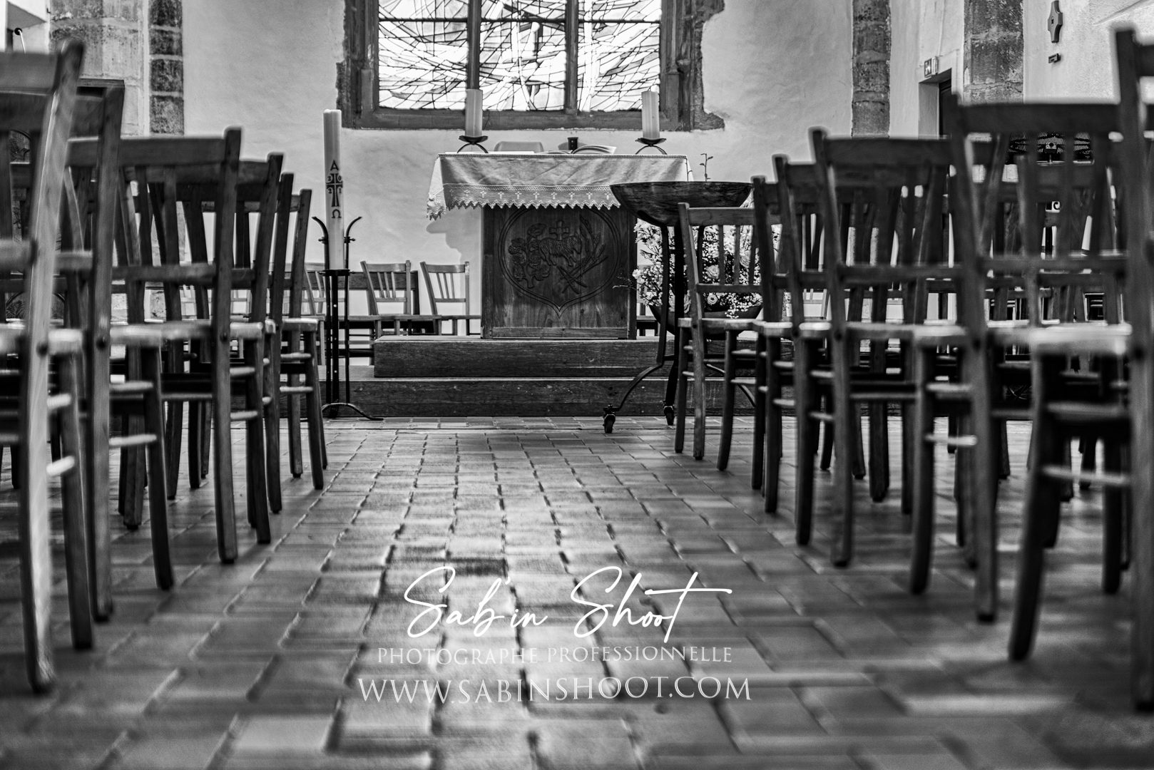 Photographie du baptême d’Ethan, reportage en noir et blanc