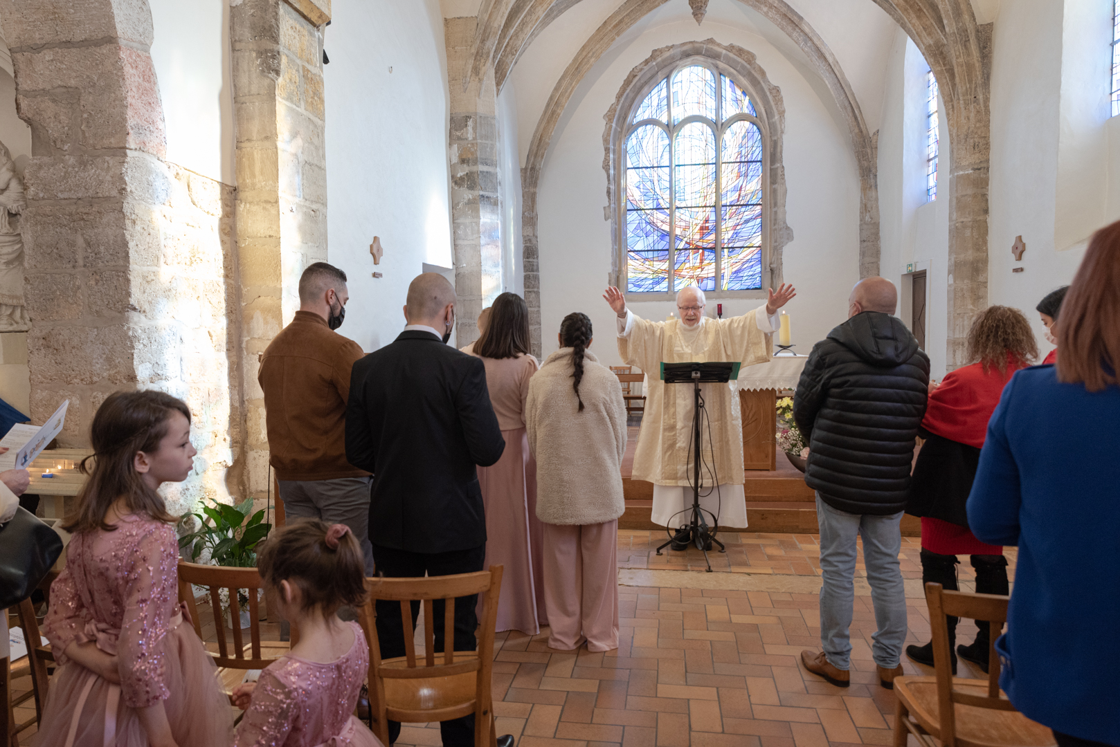 Photographie de baptême prise pendant la cérémonie
