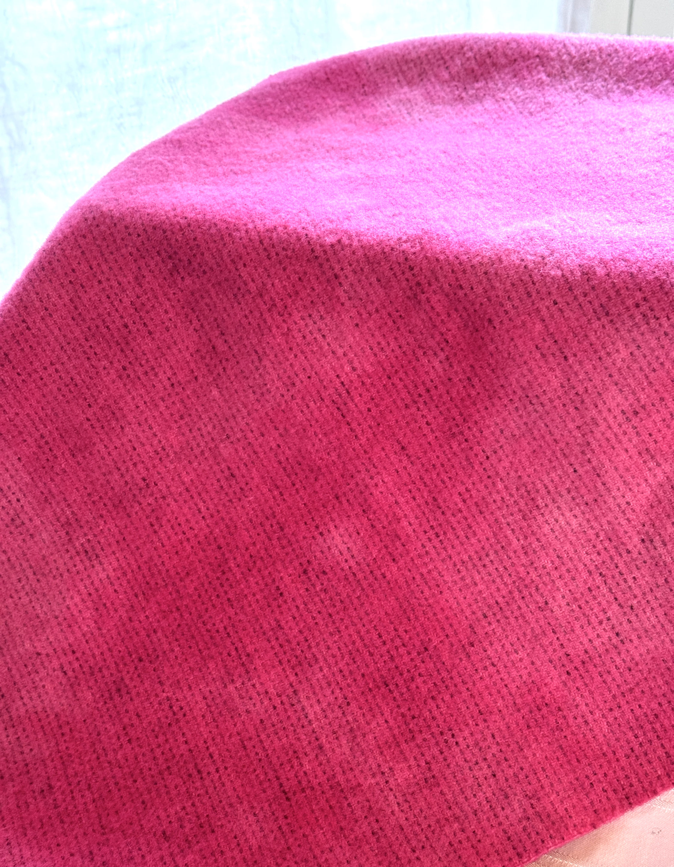 Hand dyed wool fabric in bright pink on morse code base wool