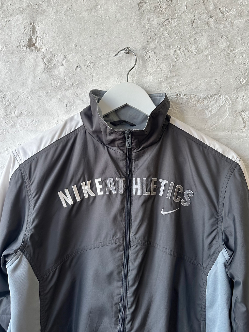 ภาพขนาดย่อ: 90s Nike Athletics Embroidered Spell Out Zip Up Grey Track Jacket Windbreaker