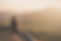 woman-sitting-floor-looking-sunset.jpg