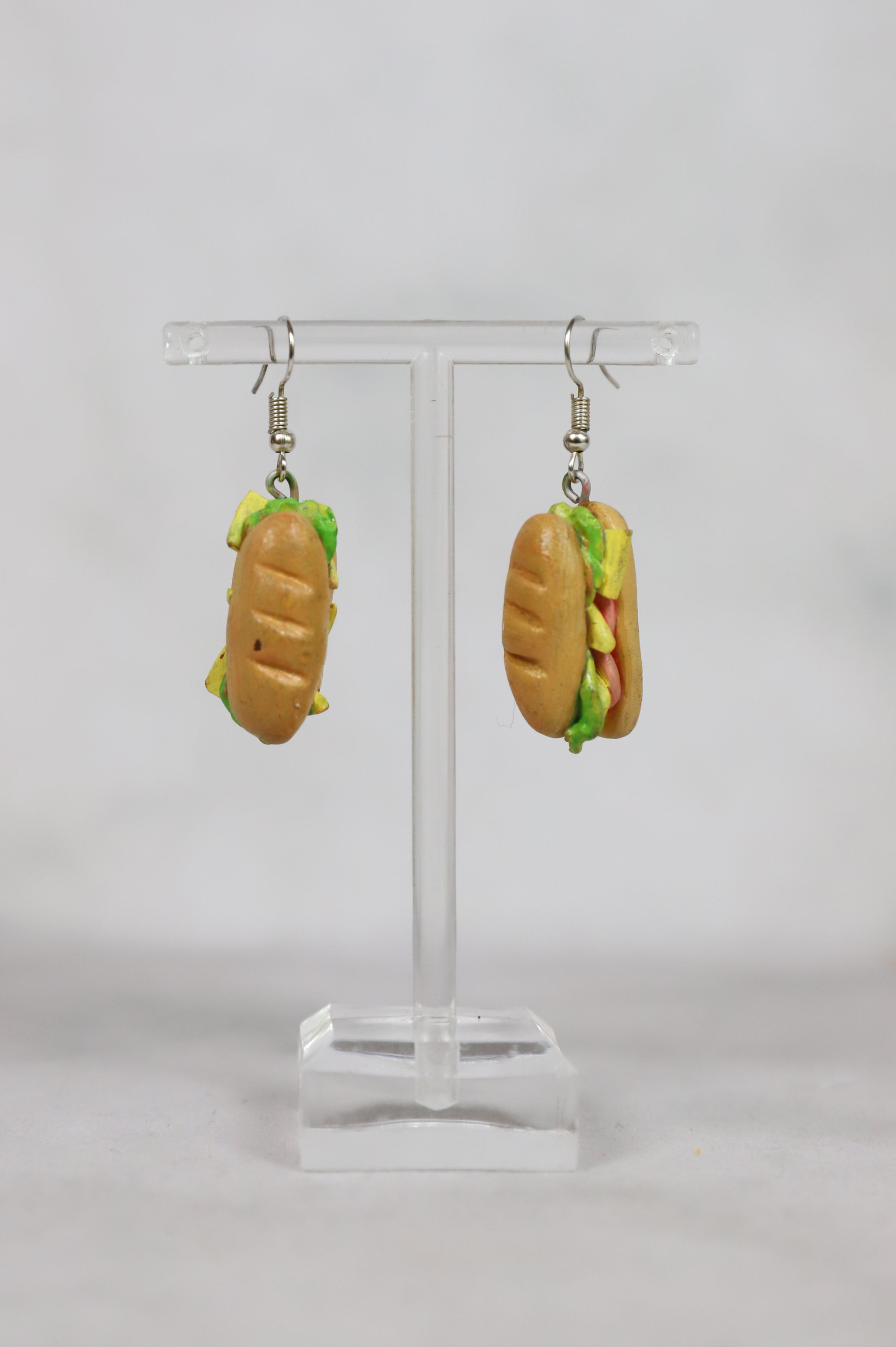 Sandwich earrings on display; food jewelry