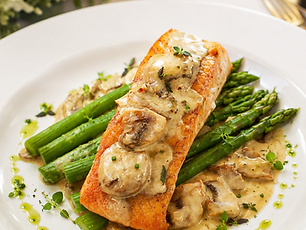 Grilled salmon entree with vegetables and elegant presentatio
