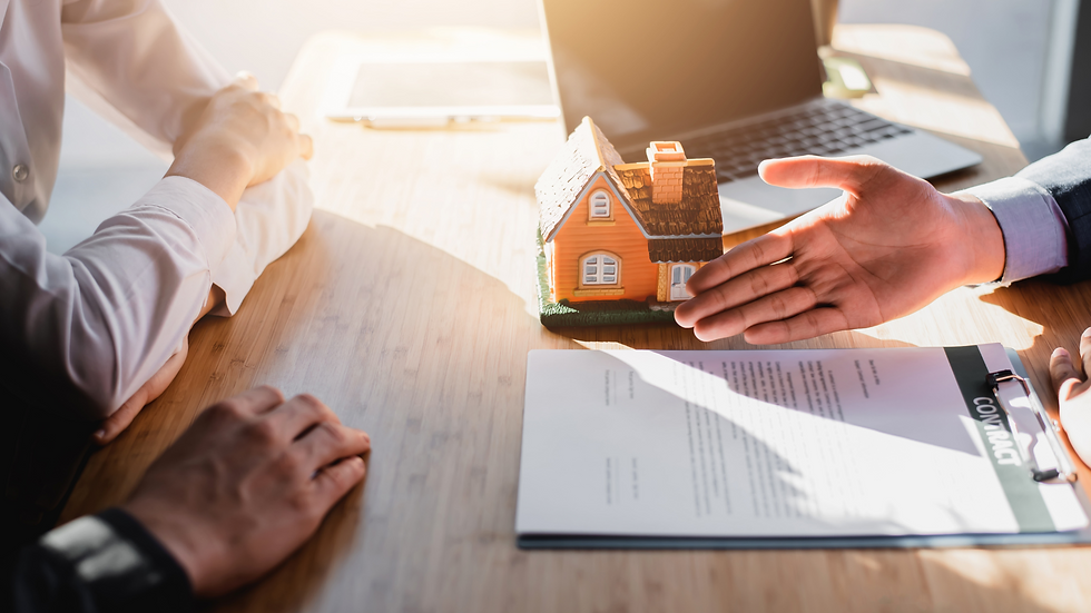 Close-up of hands reviewing buy-sell agreement during a divorce.