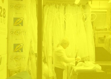 Woman working in a dry cleaning establis