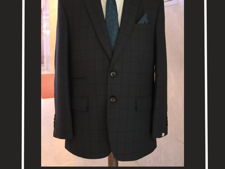 Quiet Confidence: The Power of a Perfectly Tailored Dark Check Suit