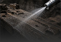 glass-bead media blasting in action