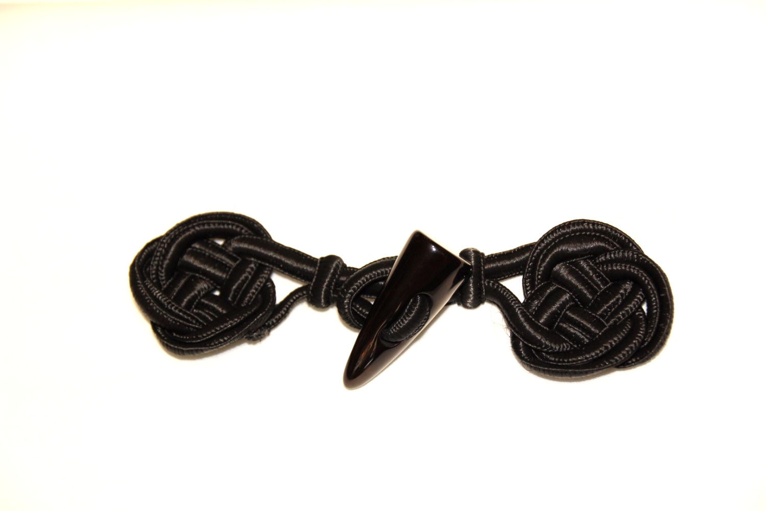 Zwarte sluiting met knoop - €6/stuk