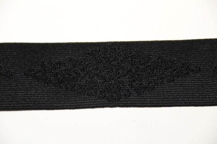 Zwarte stretchband met motiefje - €3/m