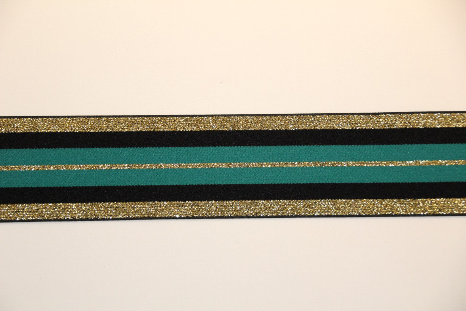 Elastische tailleband met groen en goud- €7,5/m