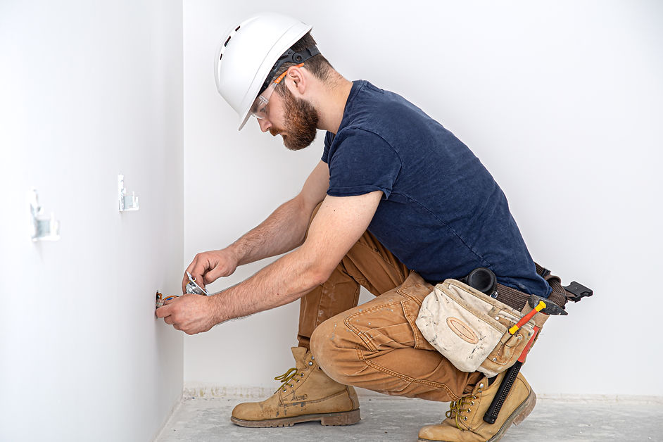 professional-overalls-with-electrician-s-tool-white-wall-background-home-repair-electrical