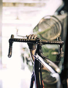 mechanic-repairing-bicycle-min.jpg