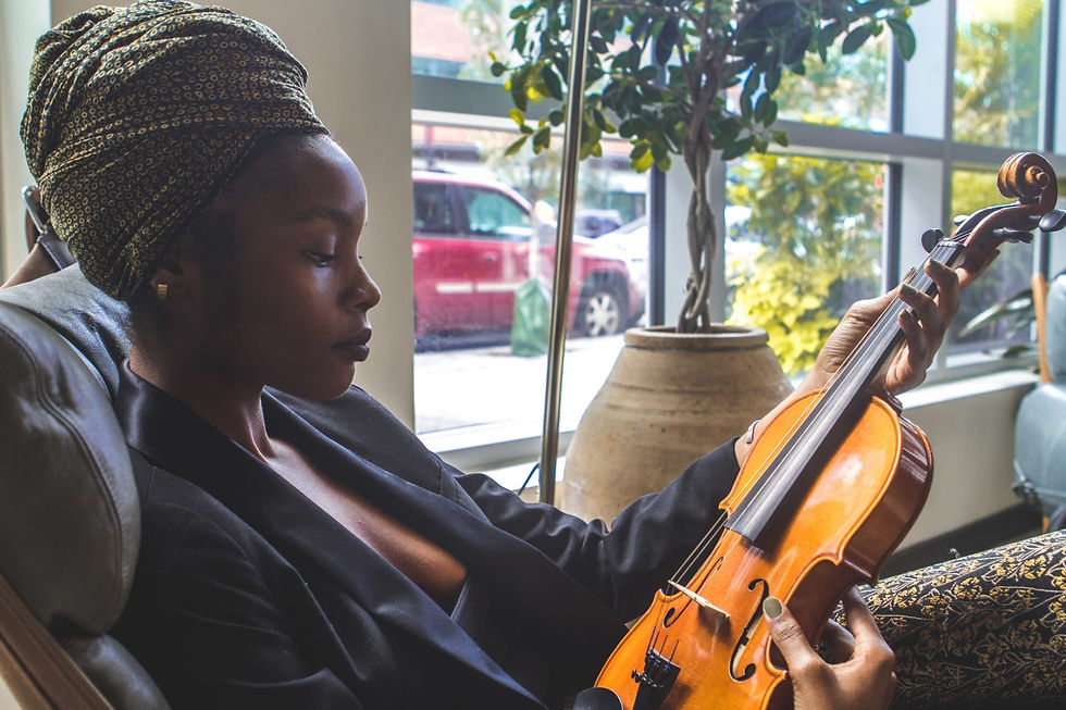black female musician with a violin