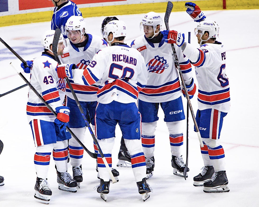 Amerks skaters #43 Conor Sheary, #28 Aidan McDonough, #59 Jake Richard, #14 Jason Polin and #63 Matthew Peca celebrating after a goal on October 9, 2026. (Photo credit: Nicole Bowland/89.1 The Point)