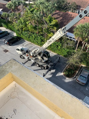 Crane Lifting HVAC Unit