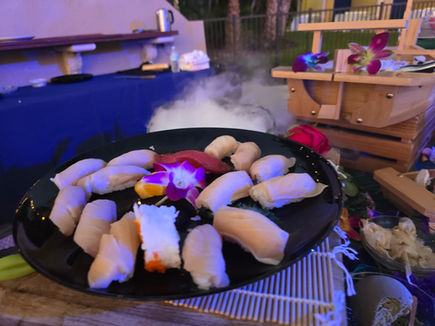 Sushi platter with orchid: Pink Cloud Catering event