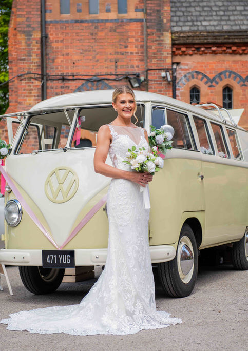 Behind-the-scenes bridal photoshoot by House of Howes Brides with bride near van in Nottingham