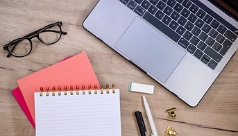 Laptop with notepad image.png