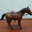 Miniature : Cheval en cuir.
