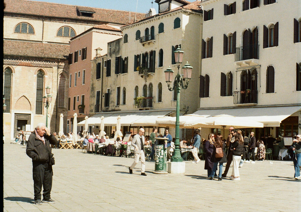 A square in Venice, Italy. Photograph taken on film by Christina Care.