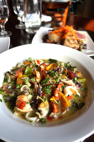 Vertically oriented image of gorgeous seafood ceviche. Vericle images work very well on social media for restaurants.