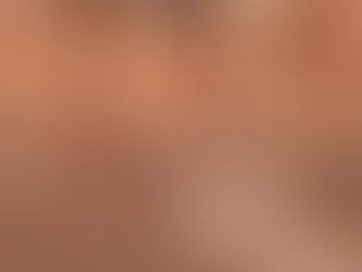 Photo of runners racing down a street