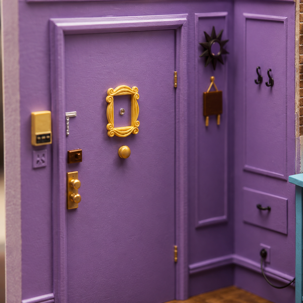 Purple dollhouse apartment door with gold hardware, S S wall hooks, and mirror; cozy, playful miniature interior.