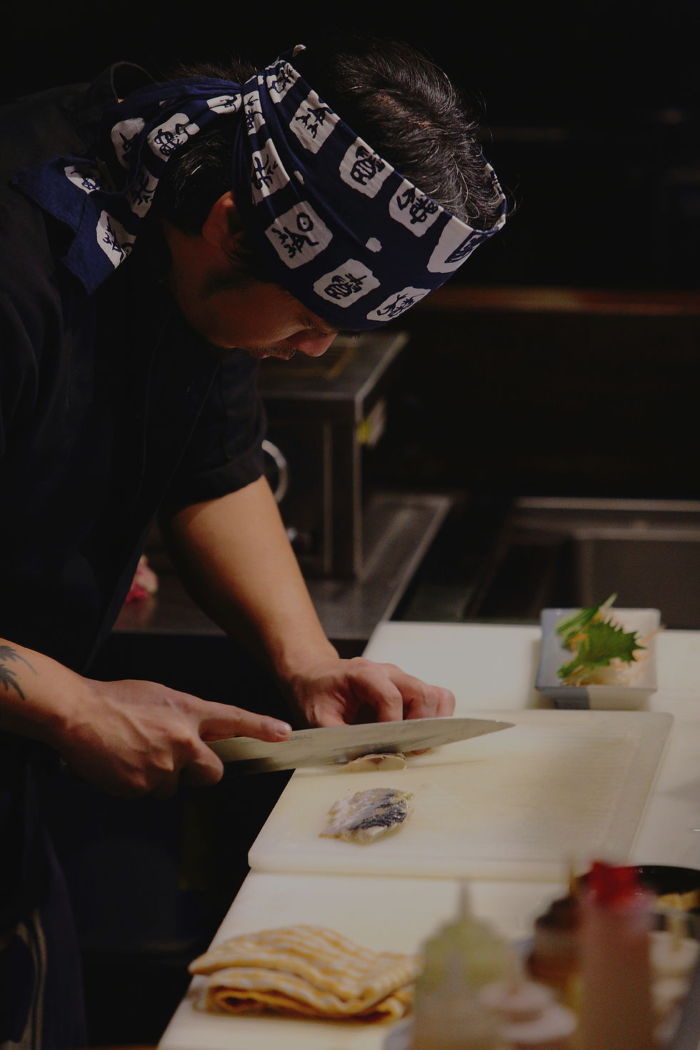 Chef Slicing Fish_edited_edited.jpg