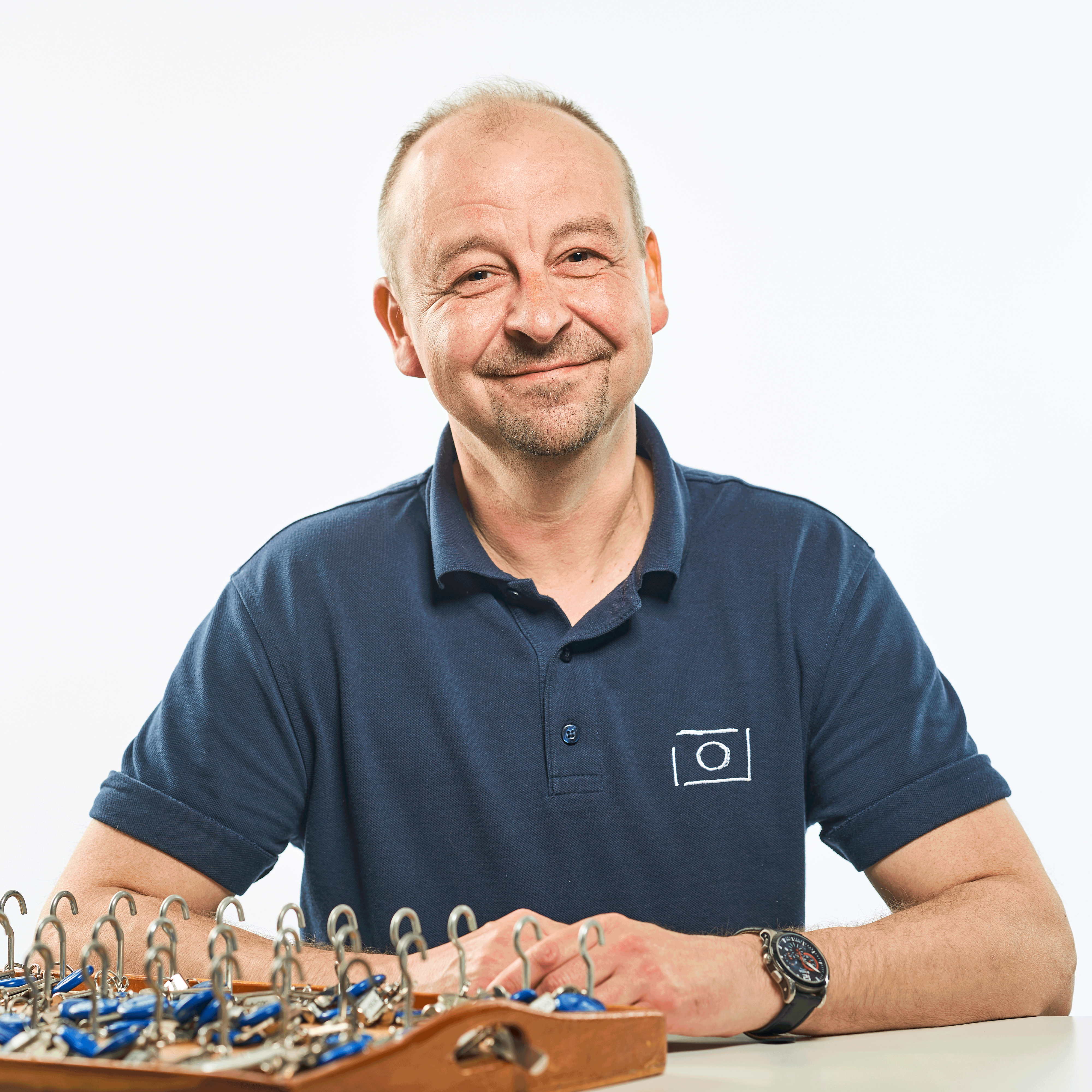 Portraits von Marc Buhl mit Schlüsselbord