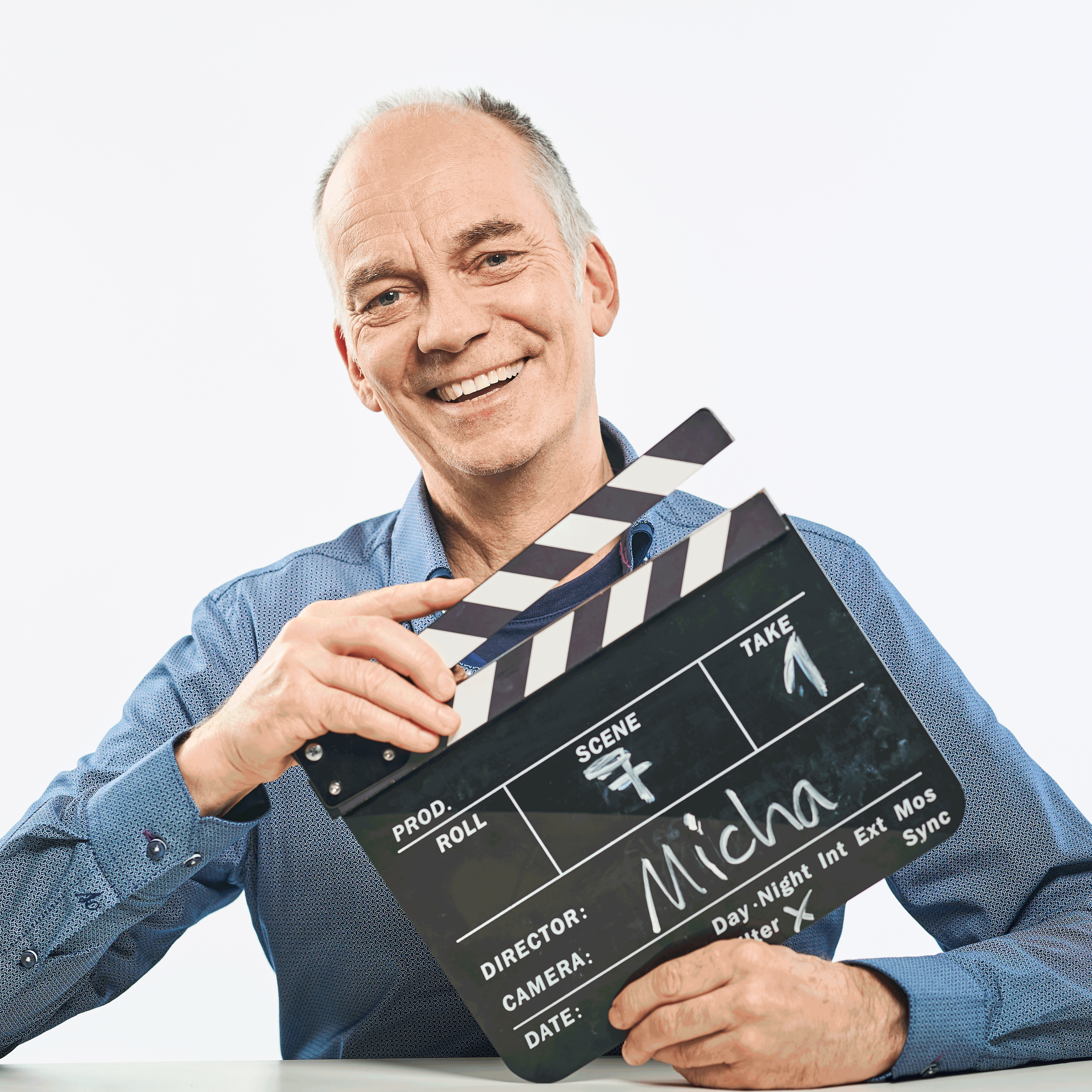 POrtrait von Michael nagel mit Filmklappe
