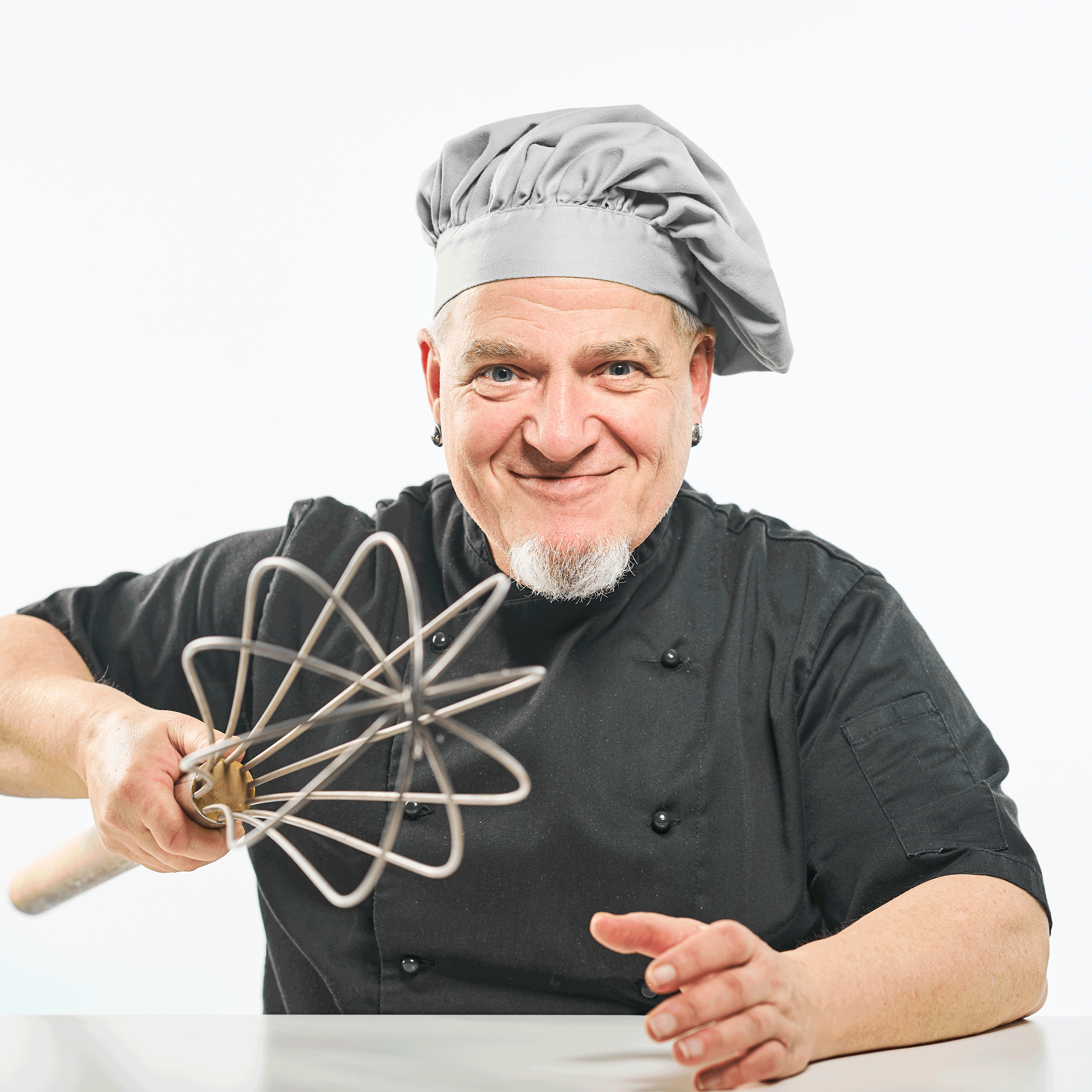 Portraits von Erich Hansen mit Schneebesen