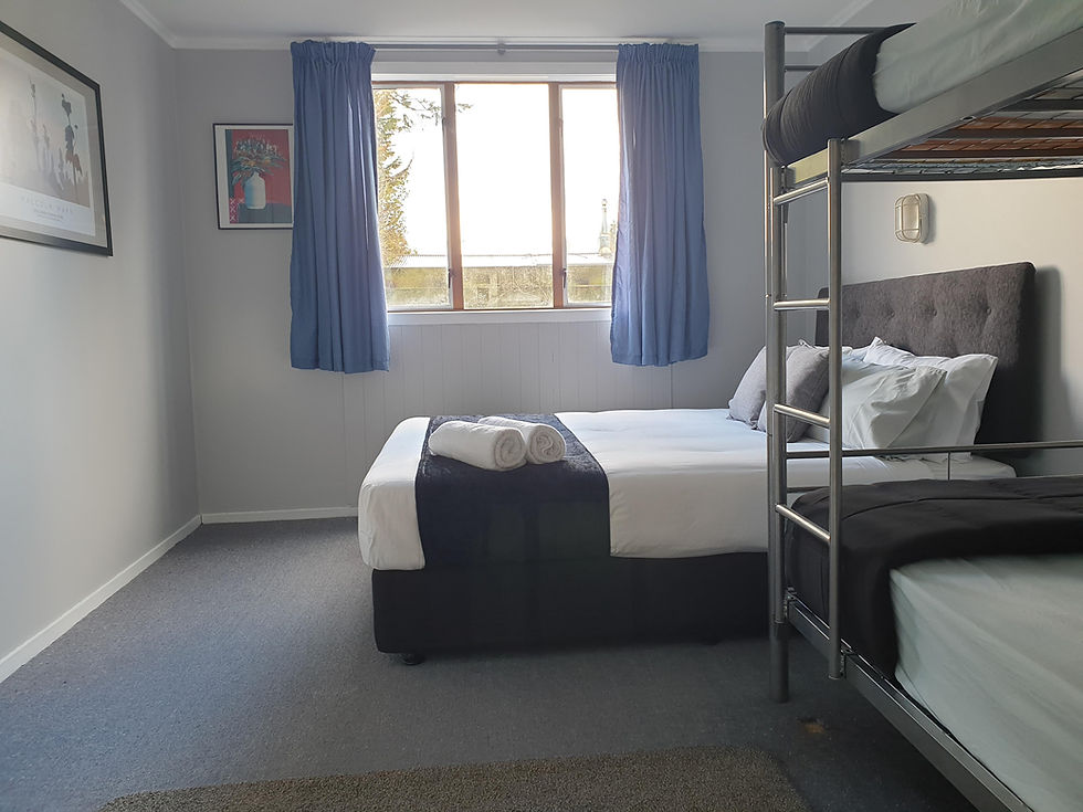 a double beg with a bunk bed adjacent