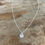 Thumbnail: Tiny Initial Necklace