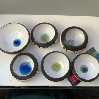 G Zordan selection of porcelain bowls with bronse rims.jpeg
